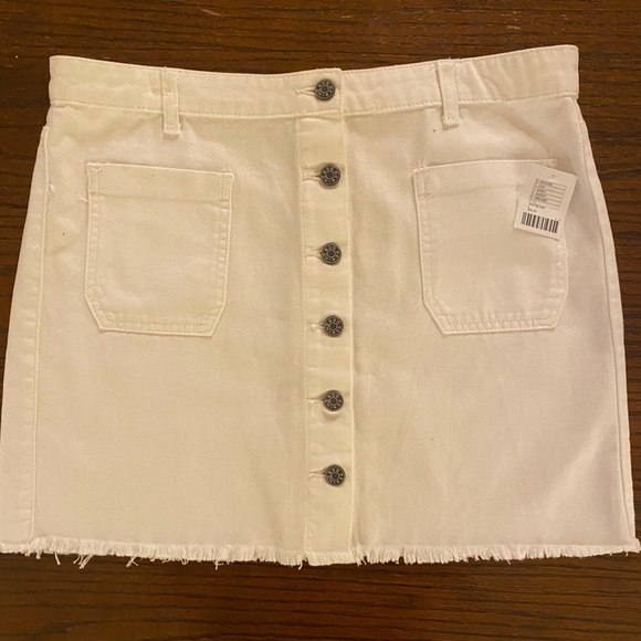 Dresses & Skirts - Brand new (tag still on) Urban Outfitters white jean skirt. Size LARGE
